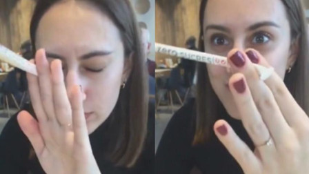 高手！女孩闭眼用两根手指精准夹住飞来纸管
